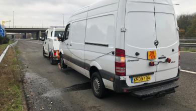 APJ (UK) LTD recovering a large van on a motorway